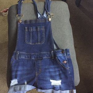 Blue jean overall shorts with rips